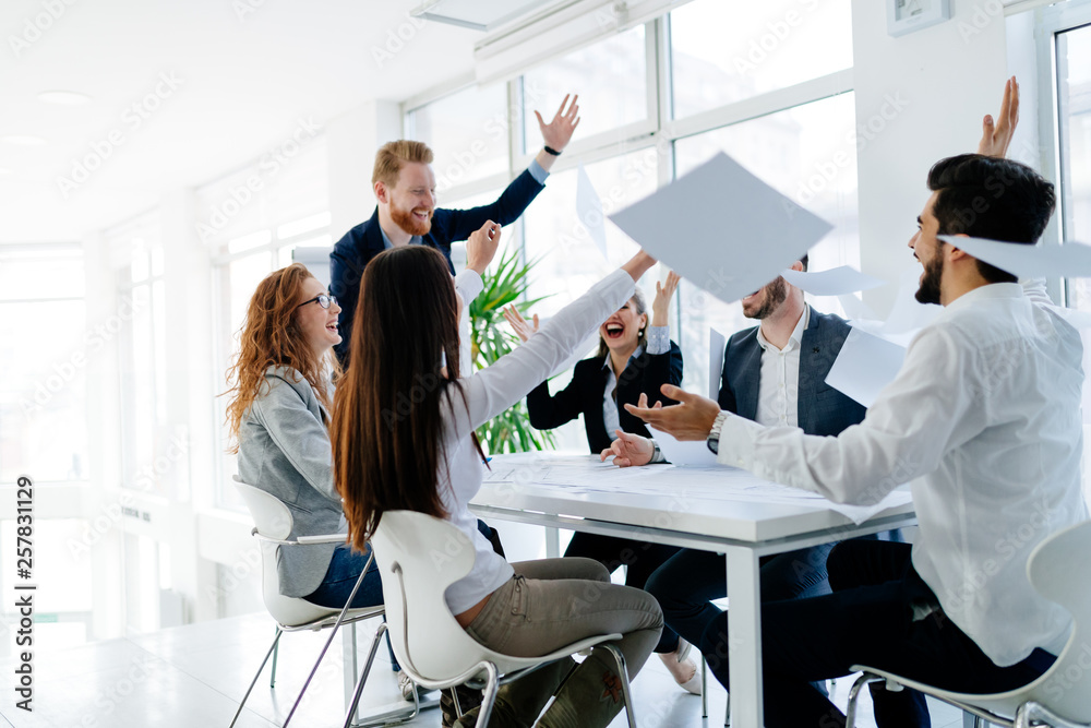 Successful company achieving goals with determined workers
