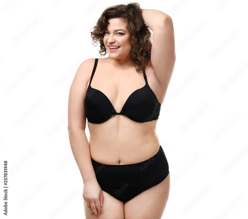 Happy plus size woman on white background. Concept of body positive Happy plus size woman on white background. Concept of body positive