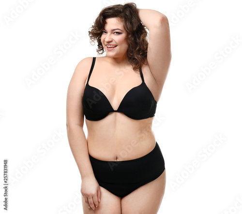 Happy plus size woman on white background. Concept of body positive