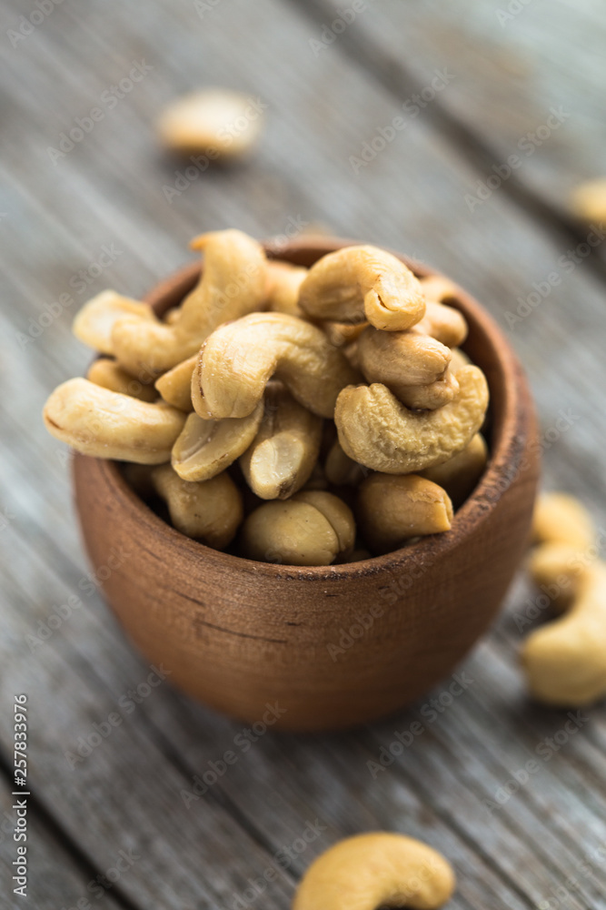 Close-up of salted Cashew Kernels. Background. Healty Cashew Kernels. Close-up of salted Cashew Kernels. Background. Healty Cashew Kernels.