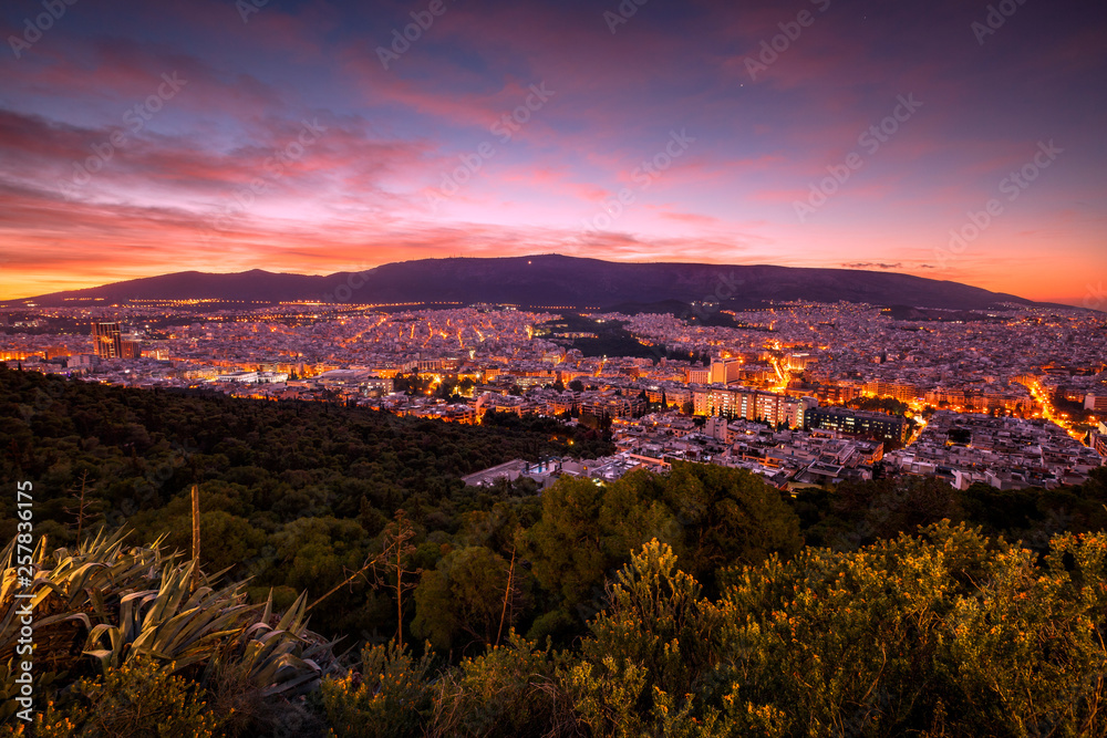 View of eastern Athens and Hymettus mountain from Lycabettus hill at dawn. 