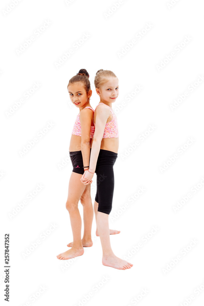 Girls in beautiful tracksuits are posing isolated Girls in beautiful tracksuits are posing isolated