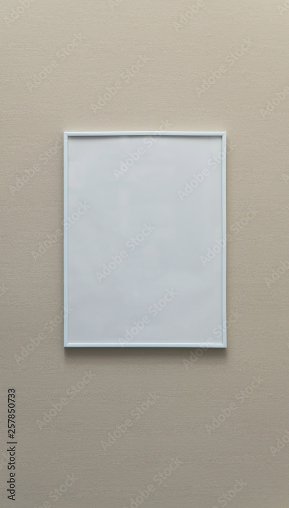 Photo frame on the wall empty template in the interior Photo frame on the wall empty template in the interior