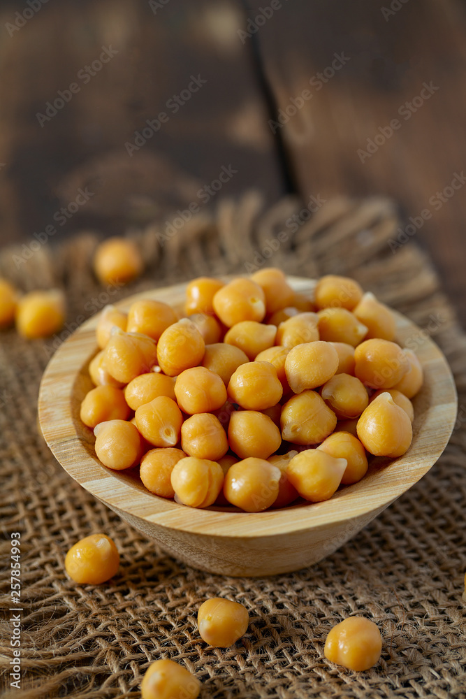 chickpeas on blue wooden surface chickpeas on blue wooden surface