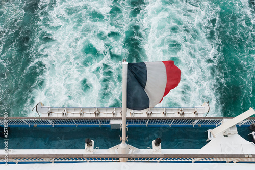 French flag on the back of a ship