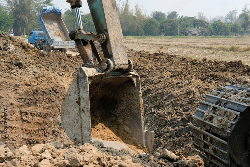excavator digging making pond. earthmoving work excavator digging making pond. earthmoving work