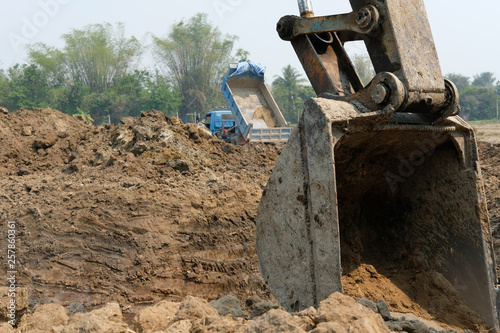 excavator digging making pond. earthmoving work