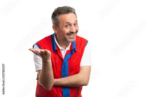 Store owner making obvious solution gesture with palm.