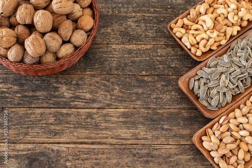nuts in a bowl on wooden table