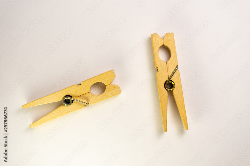 wooden clothespins on white background wooden clothespins on white background