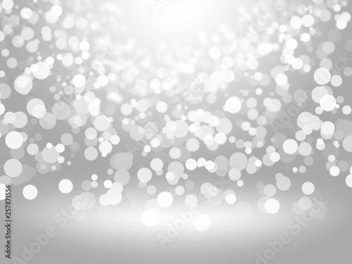 Abstract white Bokeh circles for Christmas background. White blur abstract background. Bokeh colorful glows sparkle beautiful Valentines Day concept. © PurMoon