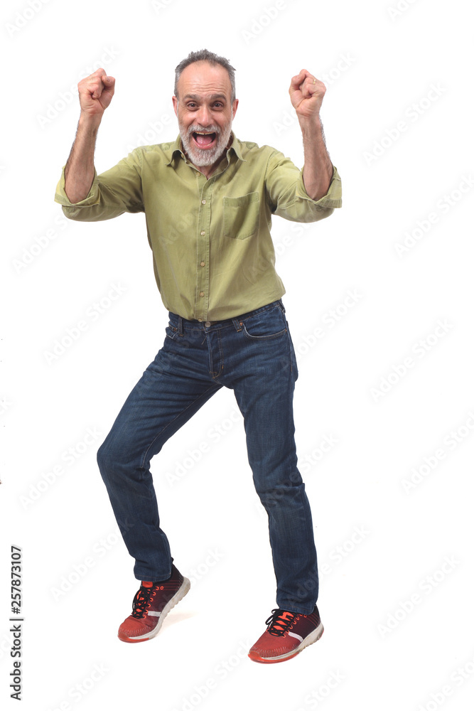 man raising her arms and smiling in victory sign on white background man raising her arms and smiling in victory sign on white background