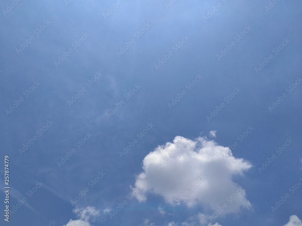 White soft cloud texture on blue sky background White soft cloud texture on blue sky background
