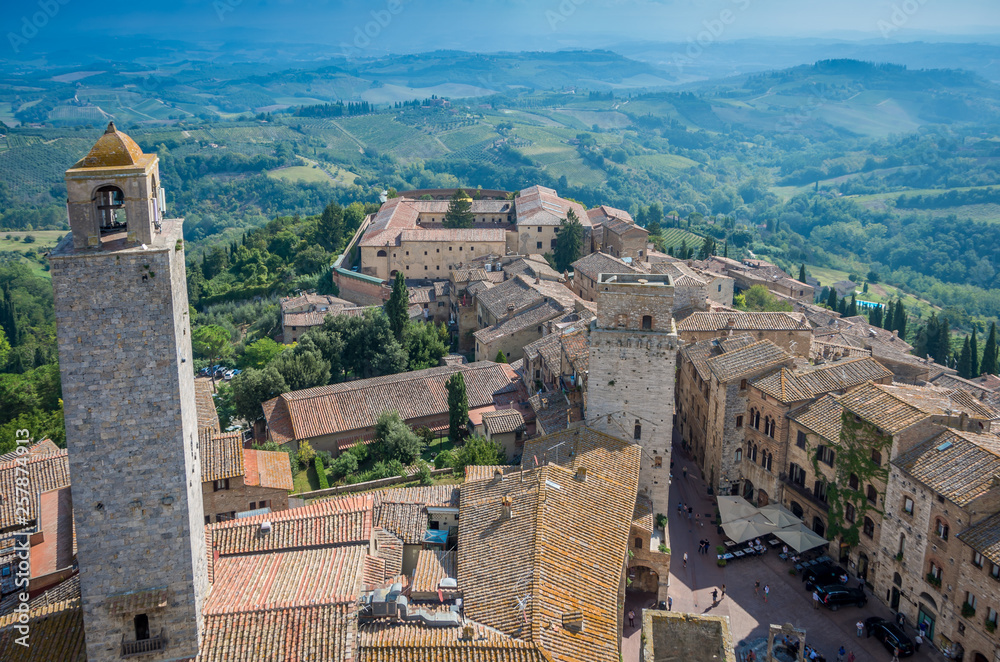 Aerial wide-angle view of the historic town of San Gimignano with Tuscan countryside, Tuscany, Italy