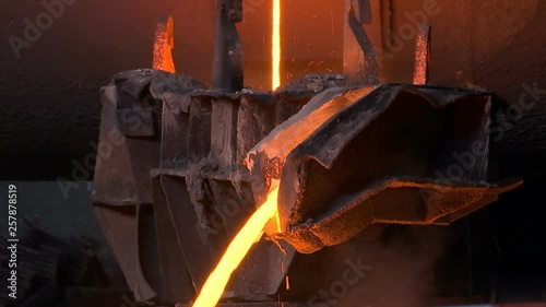 Casting  Process from Which Solid Metal Shape / Processing of copper ore in the foundry,liquid metal is poured into molds