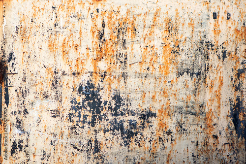 Old rusty metal plate background, blue and orange color.