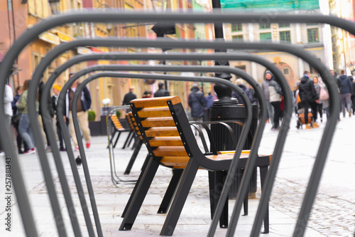 View of bench in european center of Gdansk, poland, View throgh bicycle parking