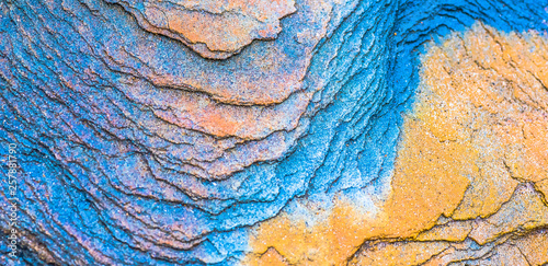 Sedimentary rocks - colourful rock layers formed through cementation and deposition - abstract graphic design backgrounds, patterns, textures