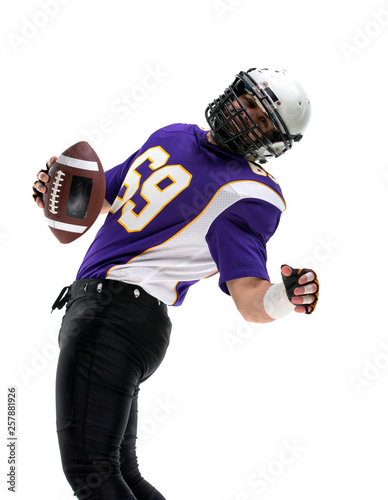 American Footballer posing in studio.