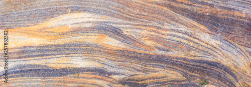 Sedimentary rocks - colourful rock layers formed through cementation and deposition - abstract graphic design backgrounds, patterns, textures