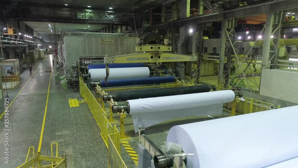 papermaking machine. Finished paper in a roll. papermaking machine. Finished paper in a roll.