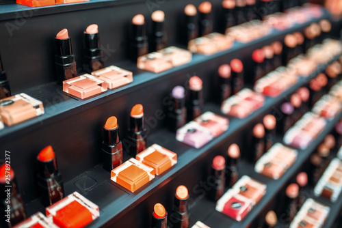 Lipstick collection in beauty shop closeup, nobody