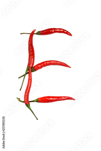 Alphabet of hot spice cayenne chili peppers isolated on white. Vegetable chili peppers in shape of letter E, for making words and logo