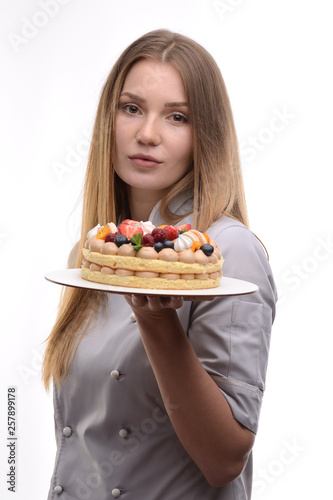 pastry chef with cake on a white background