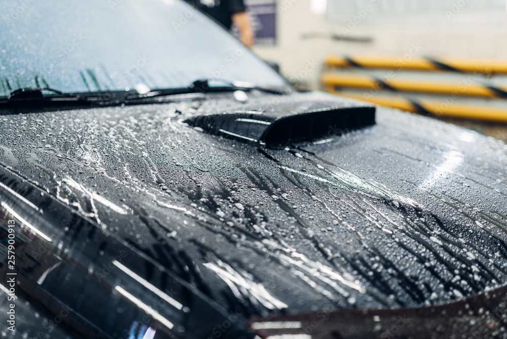Carwash service, car covered with foam Carwash service, car covered with foam