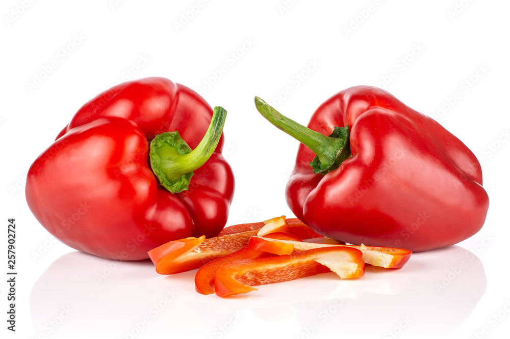 Group of two whole four slices of bulgarian red bell pepper isolated on white background Group of two whole four slices of bulgarian red bell pepper isolated on white background