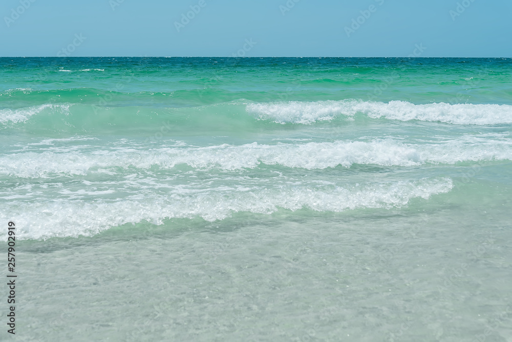 Paradise of Srichang beach,Thailand Asia.ocean wave at beach.Tropical beach for relax.Sea shore waves. Enjoy Soft wave of blue ocean on sandy beach,selective focus