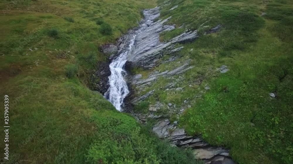 Flight over waterfall in beautiful landscape Flight over waterfall in beautiful landscape