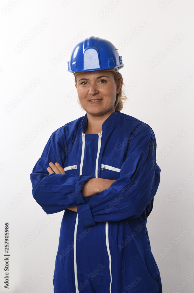 female worker in blue working on white background