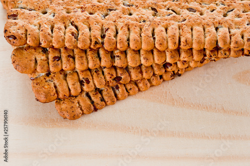 Dieting cookies with flax seeds and sunflower seeds and cracknels on the background photo