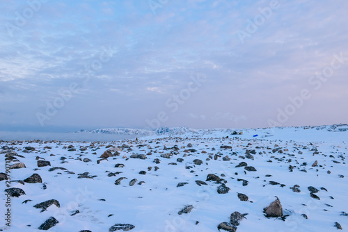 pepple beach by Arctic ocean at Teriberka, Russia photo