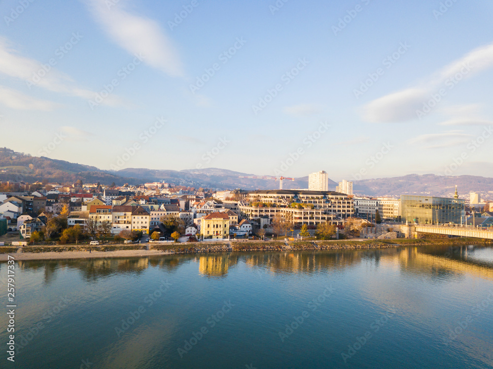 Austria, Linz, view to the city with Danube River in the foreground Austria, Linz, view to the city with Danube River in the foreground