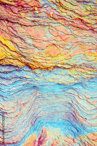 Canvas Print Colourful sedimentary rocks formed by the accumulation of sediments – natural ro