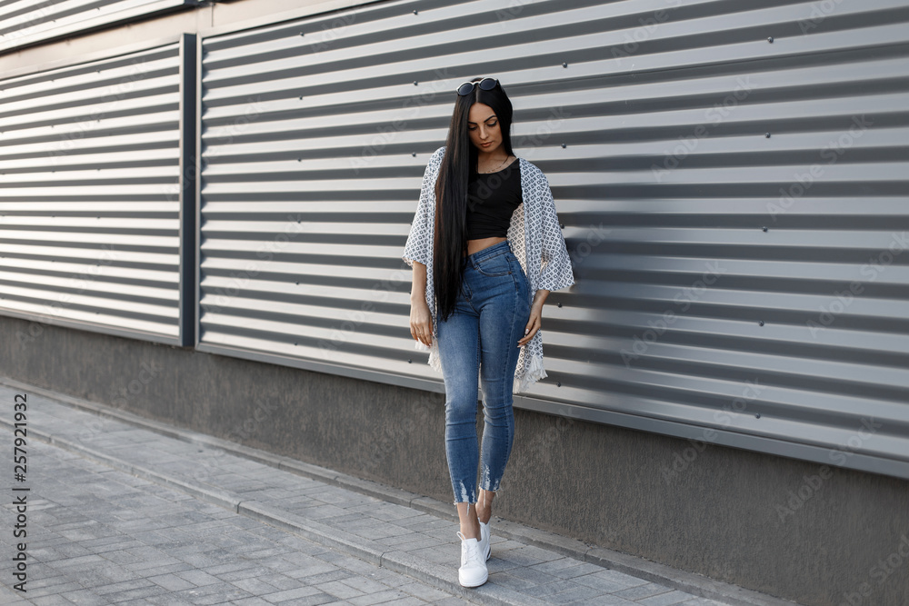 How to Style Jeans and Sneakers for Summer - Brunette from Wall Street
