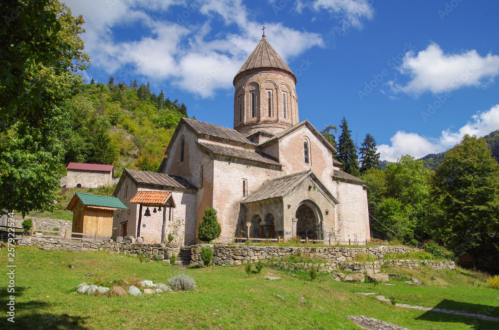 Timotesubani is a medieval Georgian Orthodox Christian monastic complex. The church is built of pink stone. Georgia, Samtskhe-Javakheti region, Borjomi Gorge Timotesubani is a medieval Georgian Orthodox Christian monastic complex. The church is built of pink stone. Georgia, Samtskhe-Javakheti region, Borjomi Gorge