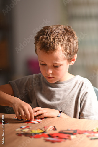 child with a puzzle game