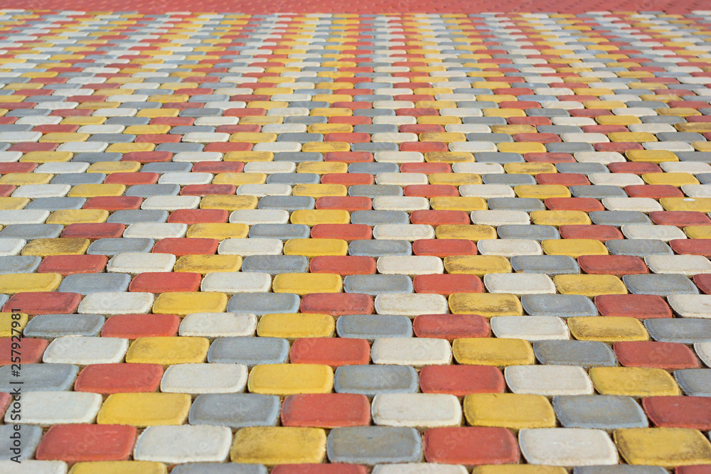 Paving slabs for pedestrian areas. Texture of paving slabs of different