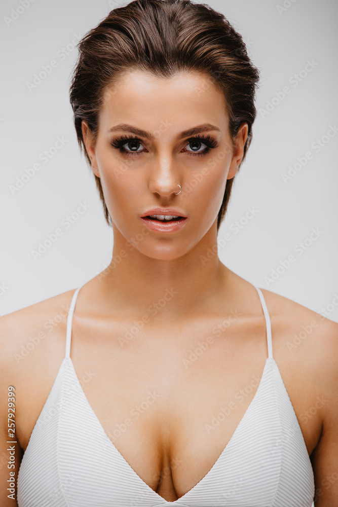Beautiful Caucasian Brunette Girl on White Backdrop Beautiful Caucasian Brunette Girl on White Backdrop