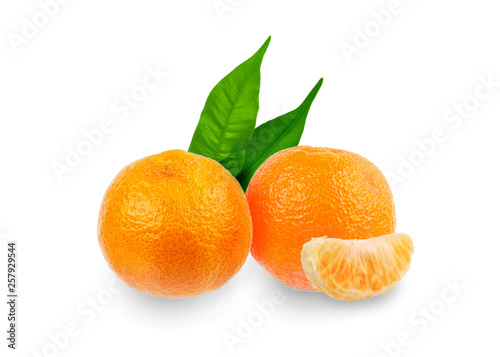 Whole tangerine peel with a slice of tangerine on a white background