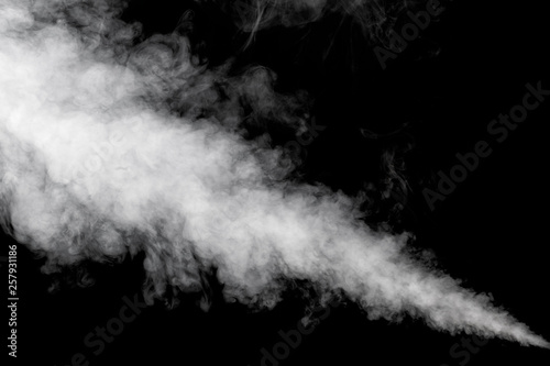 Smoke rising, black background. Spooky Steam Rising from the Ground.
