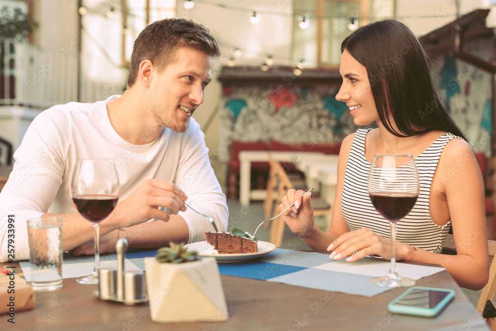 Pleasant good-looking man attentively looking into the eyes of his woman Pleasant good-looking man attentively looking into the eyes of his woman