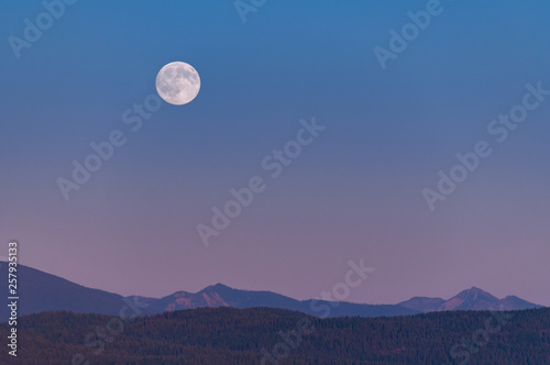 Scenic view of Swan Mountains at night