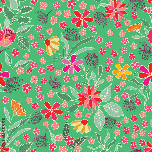 Seamless pattern with flowers and leaves on a green background