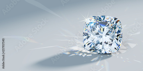 Close-up cushion cut diamond with caustics rays on light blue background