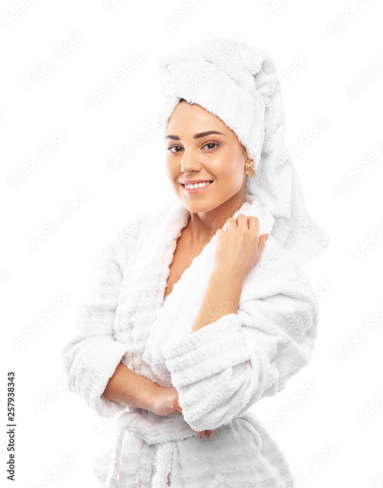 Young woman in a bathrobe and towel on her head