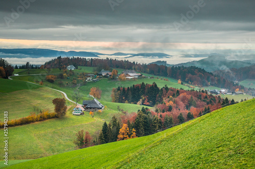 Scenic view of Emmental Valley against cloudy sky photo